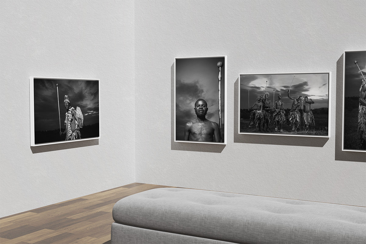 Art gallery with black and white photographs on a wall